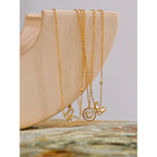 Collar Delicado Bañado en Oro 18K de Mariposa con Concha Natural