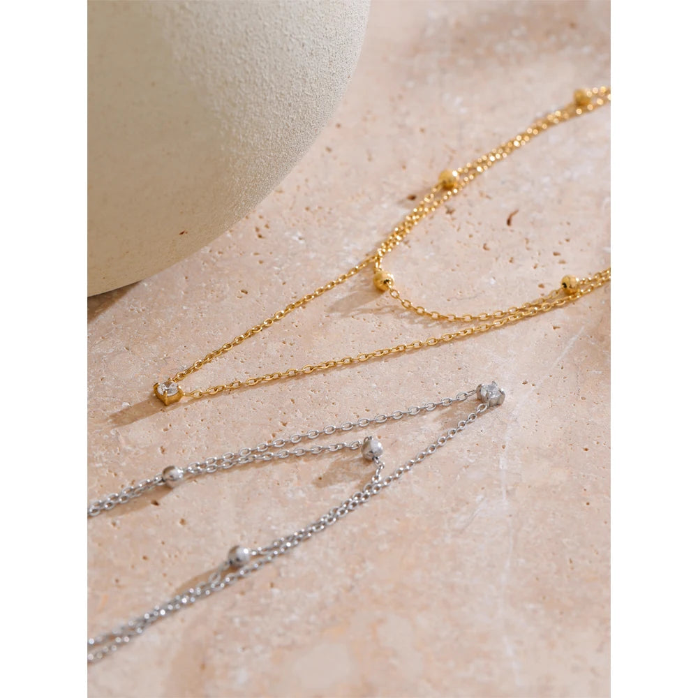 Collar Doble Capa Bañado en Oro 18K o Platino de Acero Inoxidable con Circonitas — Estilo Coreano Elegante