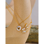 Collar Delicado Bañado en Oro 18K de Mariposa con Concha Natural